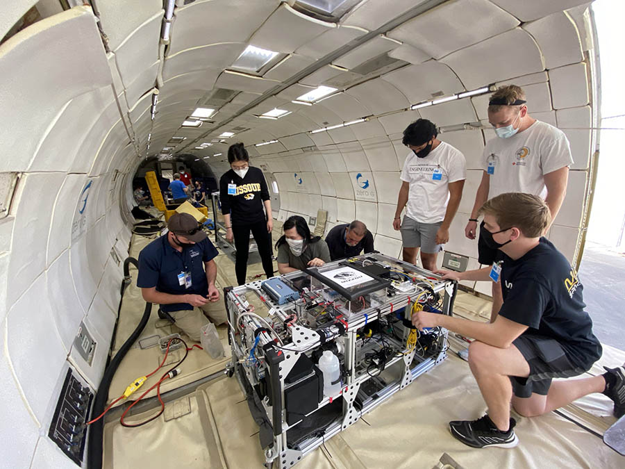 Researchers on board the G-Force One.