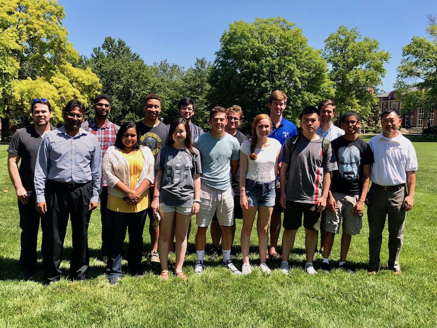 A group photo on the lawn.